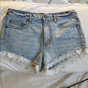 Free People lace hem denim shorts